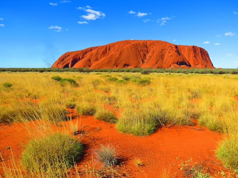 Red desert of Australia with Ayers Rock